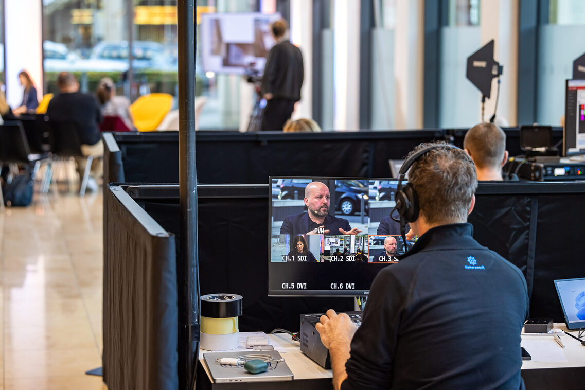 Camera team behind the event visitors