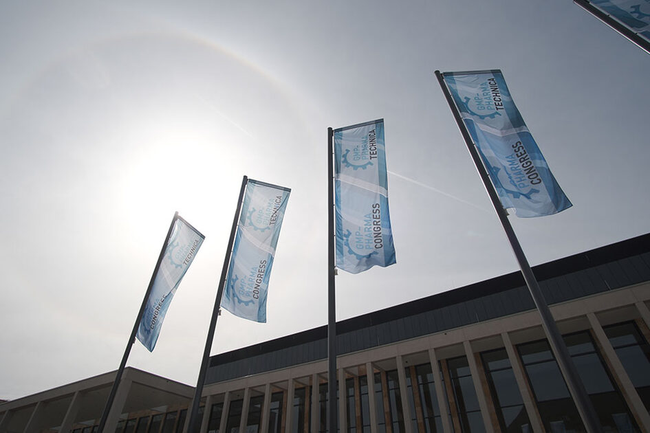 PharmaCongress flags in front of the RMCC